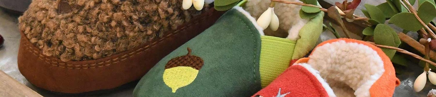 gold background with holiday pinecone graphic and a picture on the kids woven moc