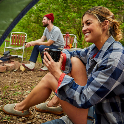 Acorn Bristol Slipper on Female Model sitting at a Campsite with Friends 
